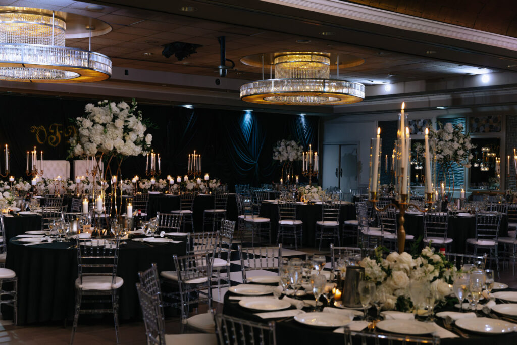 An empty ballroom at Russos on the Bay prepared for a glamorous wedding reception.