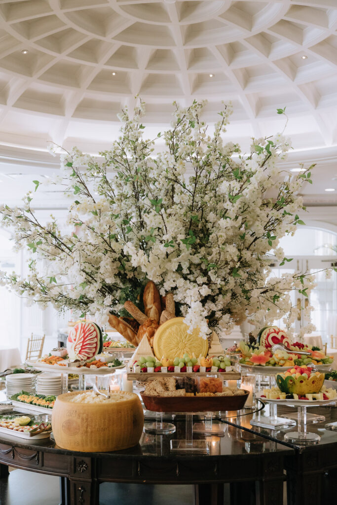A full-scale view of a buffet table filled with various foods at Park Château in New Brunswick, New Jersey.