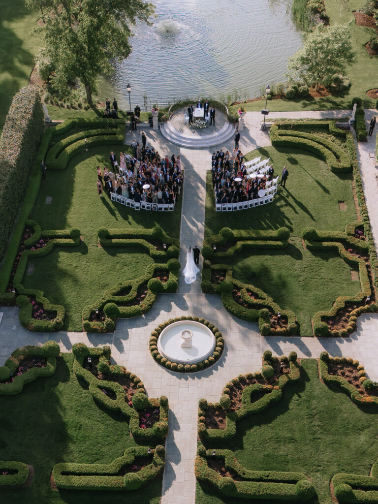 An aerial drone view of the wedding ceremony at Park Château Estate & Gardens in New Brunswick, New Jersey.