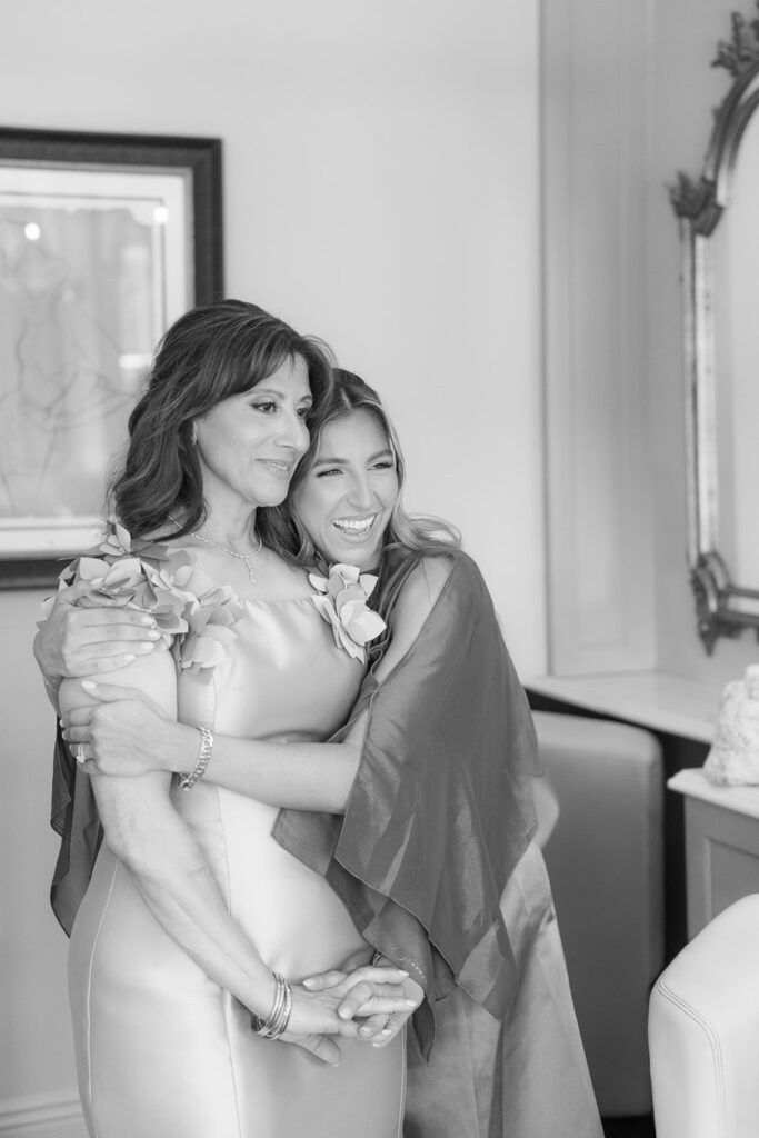 A mother and daughter embrace at a Palestinian-Egyptian Muslim wedding at Park Château Estate, New Jersey.