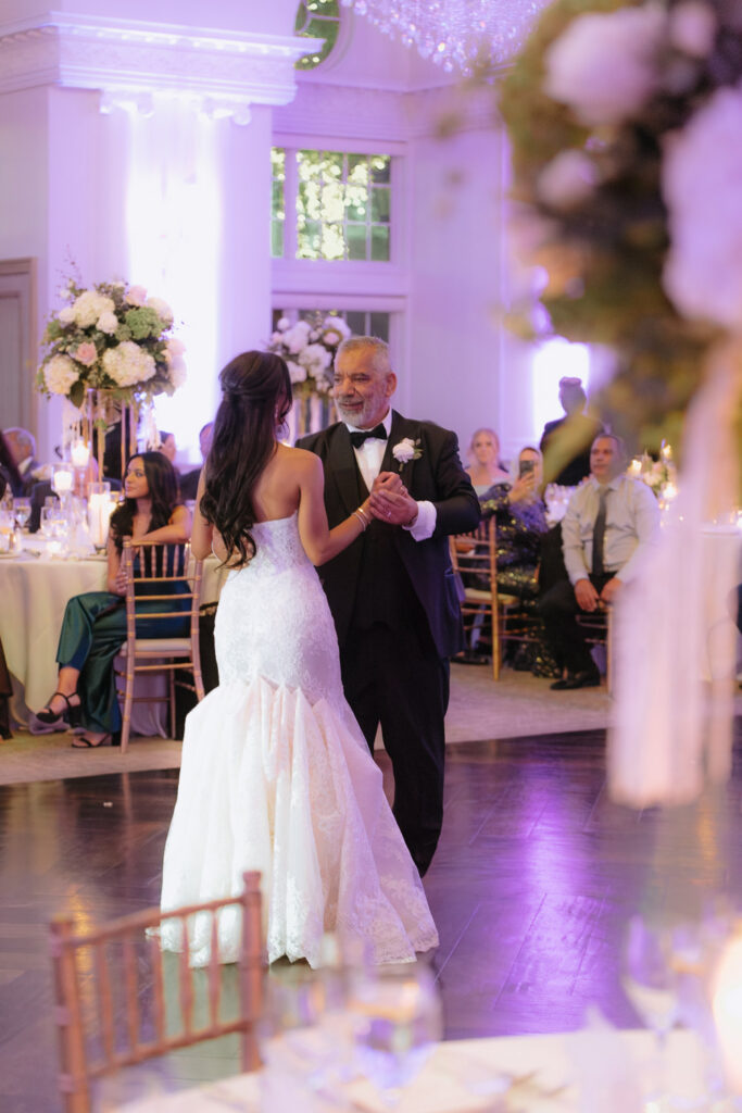 A bride dances with her father at a wedding reception at Park Chateau in New Brunswick, New Jersey.