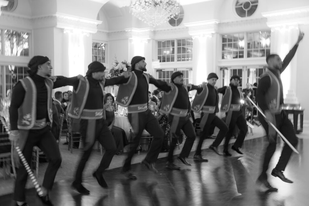 Men dancing a Dabke performance at a Palestinian-Egyptian Muslim wedding at Park Château Estate & Gardens.